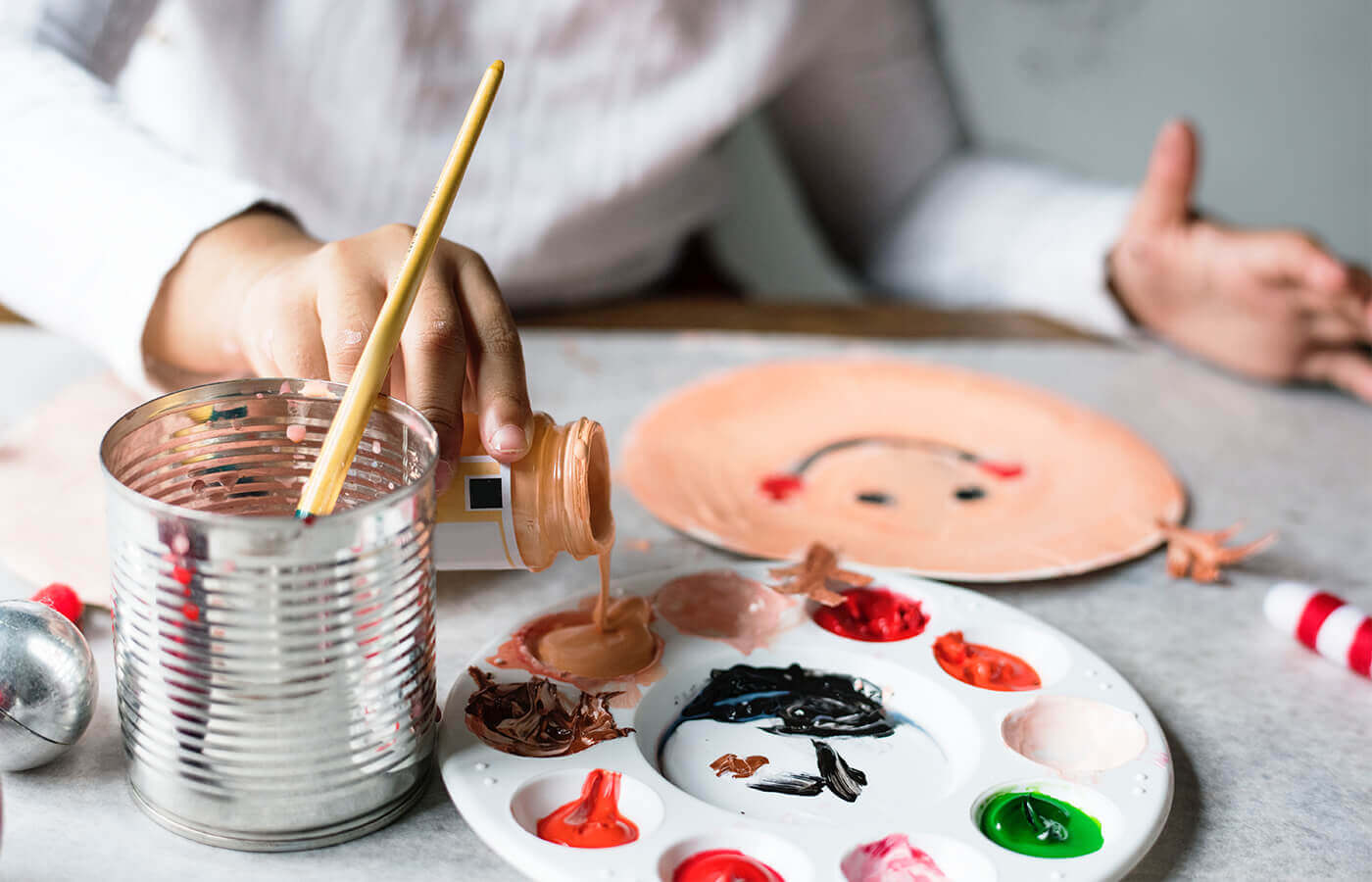 Person preparing paint colours