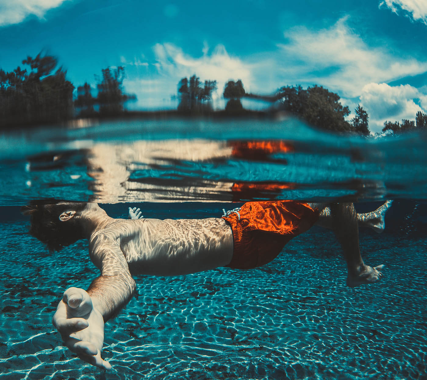 Person submerged in a Petticool pool
