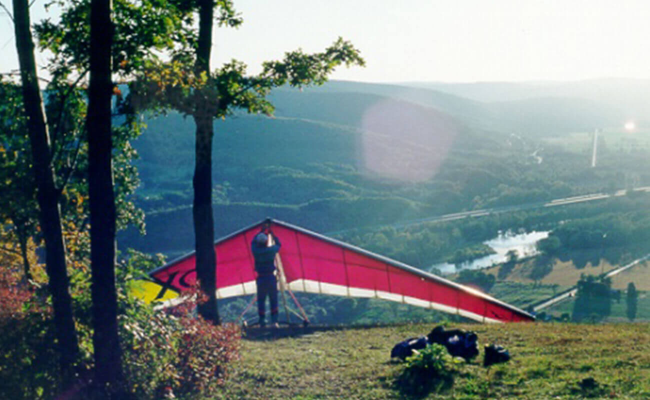 Person preparing to hang glide at High Perspective