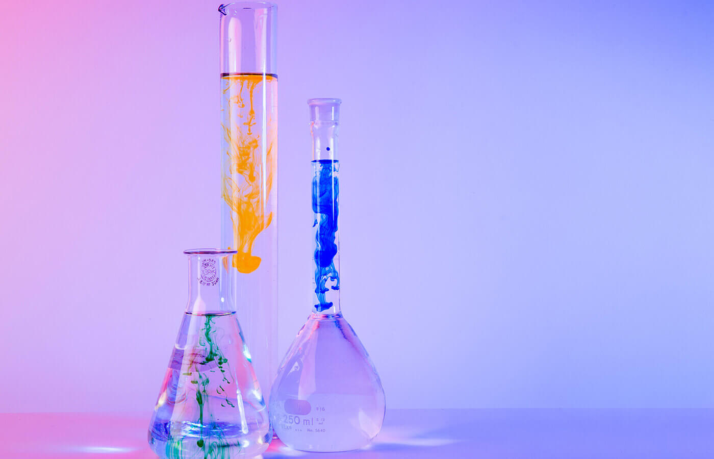 Three flasks with elements mixed in them