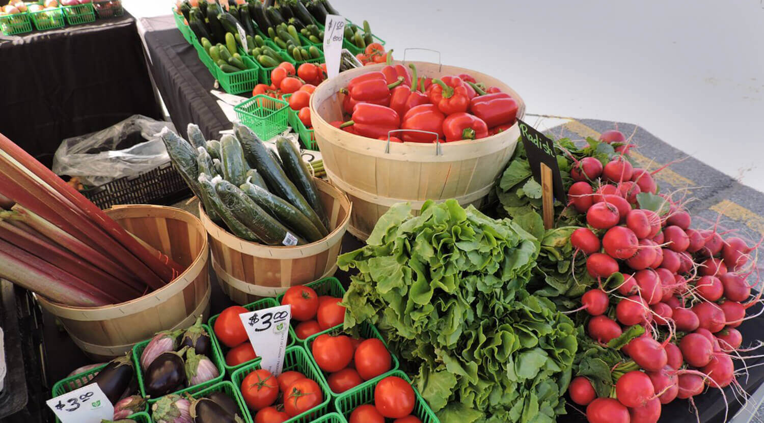 An assortment of vegetables at an outdoor market